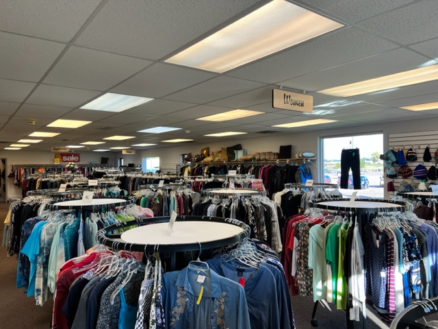 Racks filled with clothing in a thrift store