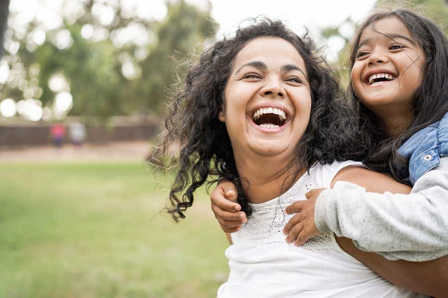 Happy,Indian,Mother,Having,Fun,With,Her,Daughter,Outdoor,- 